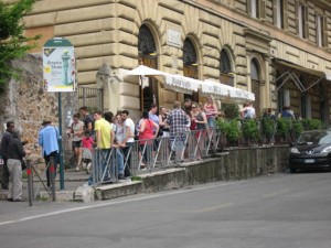 Restaurant with Colosseum view on top of the step way near the Hop on-Hop off bus stop